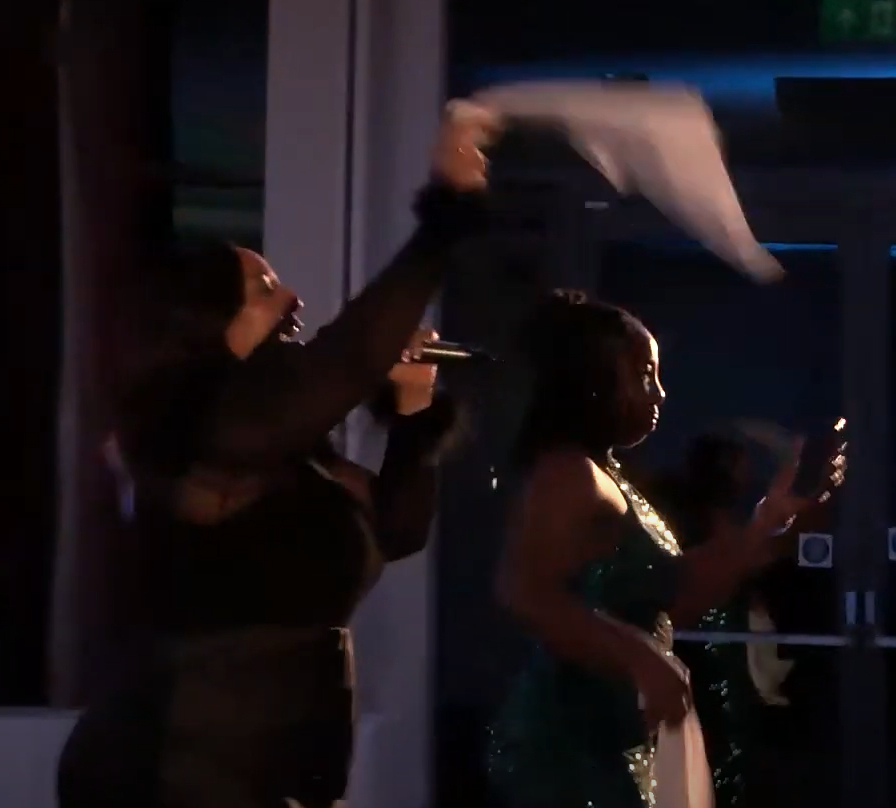 Lurine and Davia waving the blues away