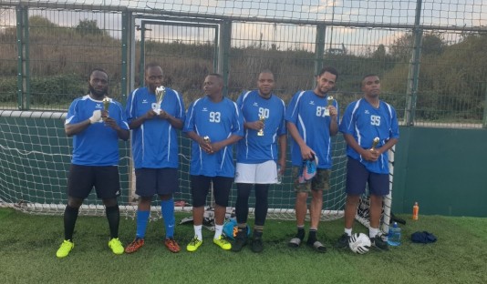 Highlanders United Society refugee football team - six players wearing blue football shirts