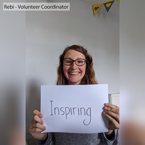 Rebi chooses the word 'Inspiring' to describe volunteers