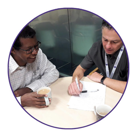 Chris Hill, Social Enterprise Development Coordinator, helping a client